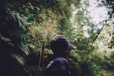 Rear view of man in forest