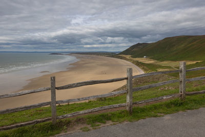 Summer landscape on worm s head and rhosilli bay in wales