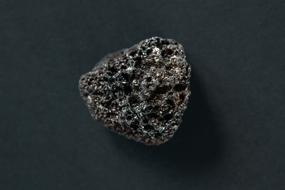 High angle view of bread on table against black background