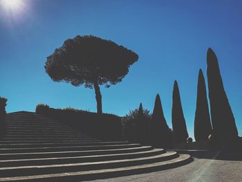 Low angle view of staircase against blue sky