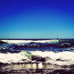 Scenic view of sea against clear sky