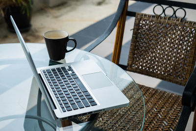 High angle view of coffee cup on table