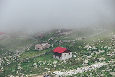 High angle view of houses and buildings on mountain