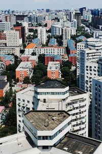 High angle view of buildings in city against sky