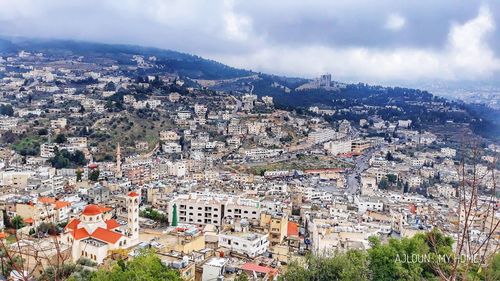 High angle shot of townscape against sky