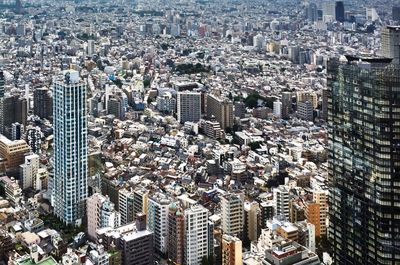 High angle view of modern buildings in city