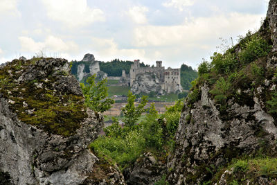 Scenic view of cliff against sky