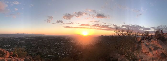 Scenic view of landscape against sky during sunset