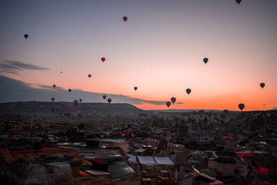 View of city against sky during sunset