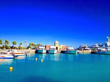 Boats in calm blue sea