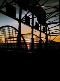 Built structure against sky at sunset