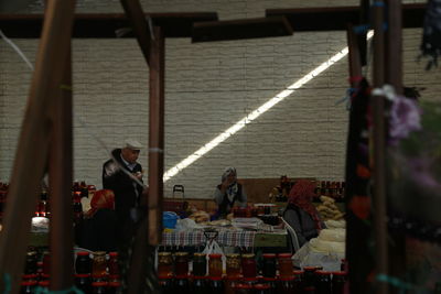 People waiting at railroad station