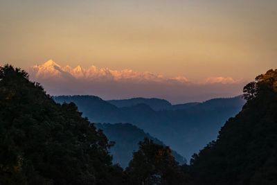 Scenic view of mountains against sky during sunset