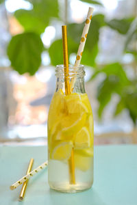 Close-up of drink on glass table