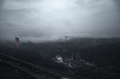 High angle view of castle on mountain against sky