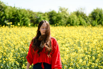 Woman standing on field