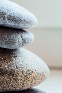 Close-up of pebbles stack on table