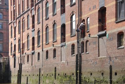 Window washer working at speicherstadt