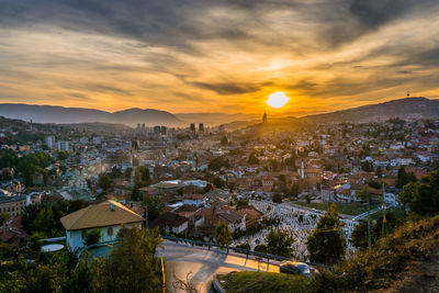 High angle view of townscape against sky during sunset