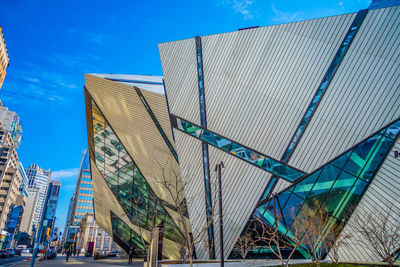 Low angle view of modern buildings against sky