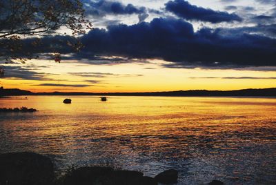 Scenic view of sea at sunset