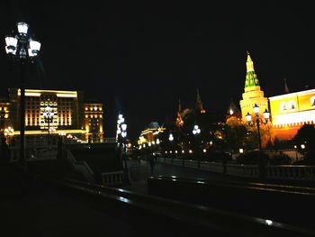 Illuminated buildings in city at night