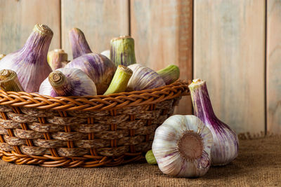 Close-up of garlic in basket