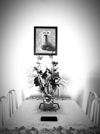 Flower vase on table at home