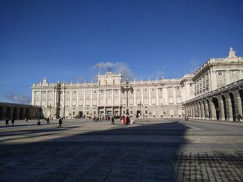 View of town square against clear blue sky