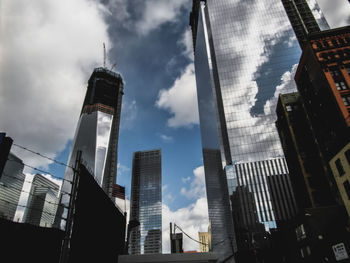 Low angle view of skyscrapers against sky