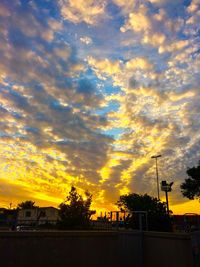 Scenic view of dramatic sky during sunset