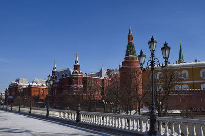 Historic building against clear blue sky in city