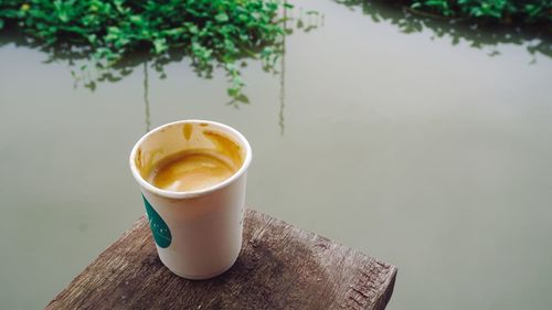 Close-up of coffee cup on table