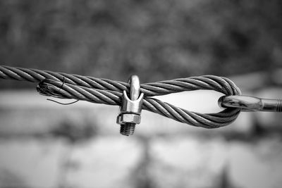 Close-up of rope tied to metal
