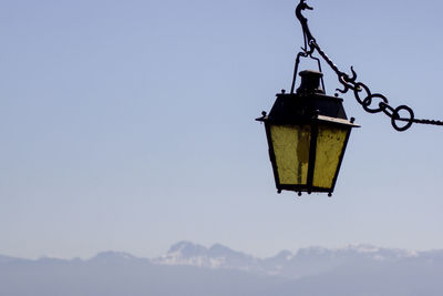 Low angle view of street light against sky