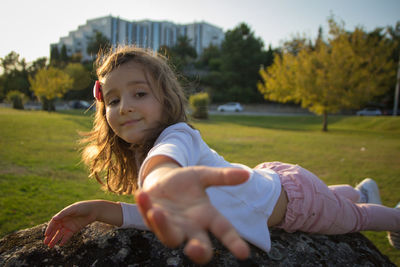 Portrait of girl on field