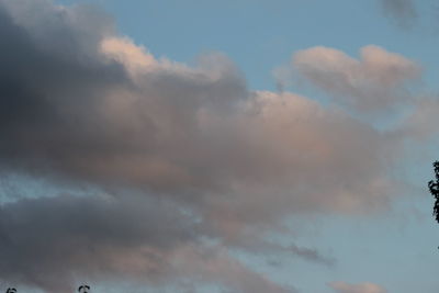 Low angle view of rainbow in sky