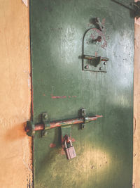 High angle view of padlocks on wall