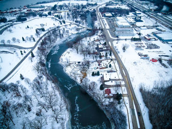 Aerial view of green bay wisconsin public park. fresh snow on the ground with frozen river. 