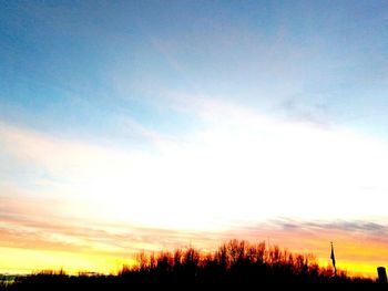Scenic view of silhouette landscape against sky during sunset
