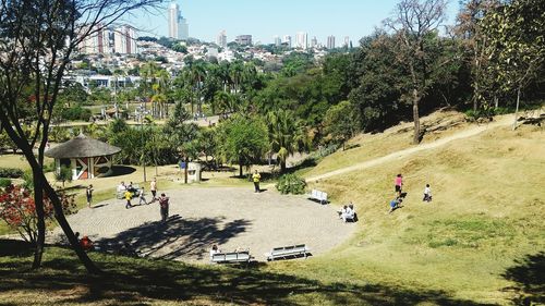 High angle view of people in park during sunny day