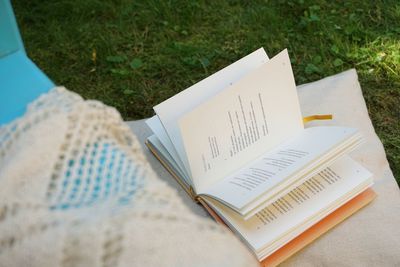 High angle view of book on table