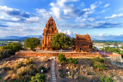 View of temple against cloudy sky