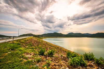 Scenic view of lake against sky during sunset