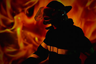 Firefighter against fire