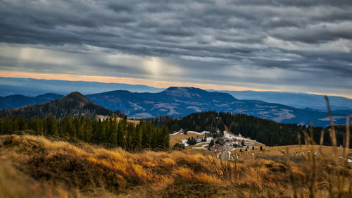 Scenic view of landscape against sky during sunset