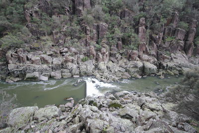 Scenic view of river amidst rocks