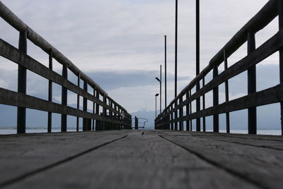 Surface level of bridge against sky