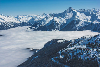 Scenic view of snowcapped mountains during winter