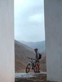 Man riding bicycle on mountain